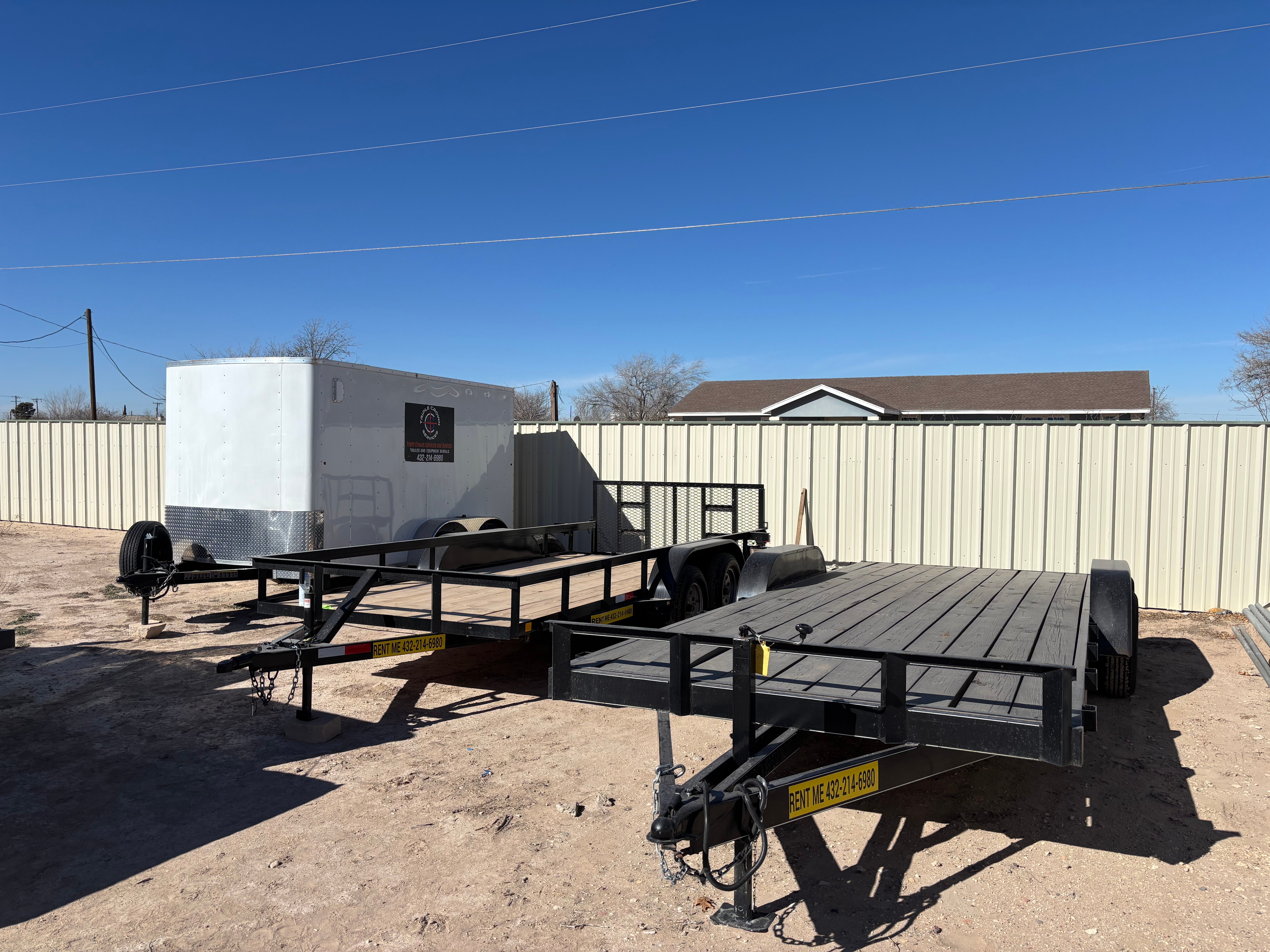 Triple Crown Rentals trailer yard with enclosed and utility trailers